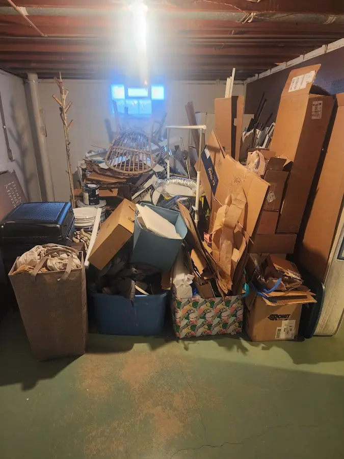 Roll-off dumpster container at job site for Construction Dumpster Rental in Walpole